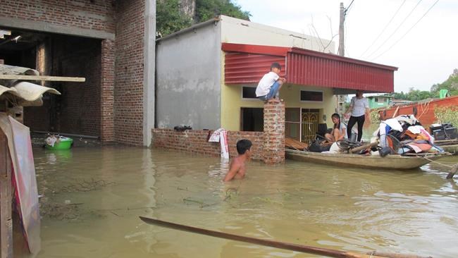 Some villages in Vietnam still isolated by flooding damage | iNFOnews.ca