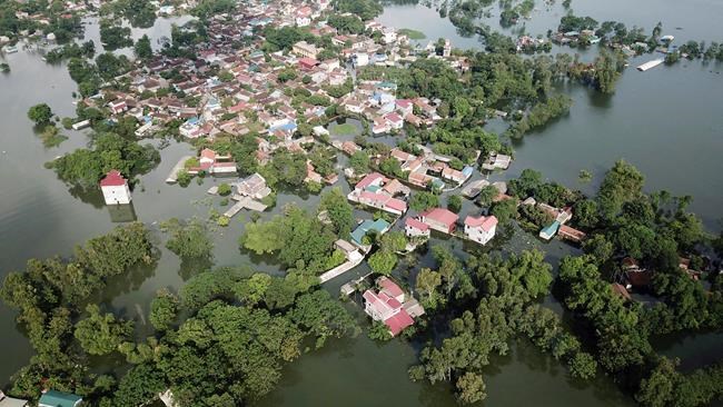 Vietnam floods kill 3, threaten to submerge parts of Hanoi | iNFOnews.ca