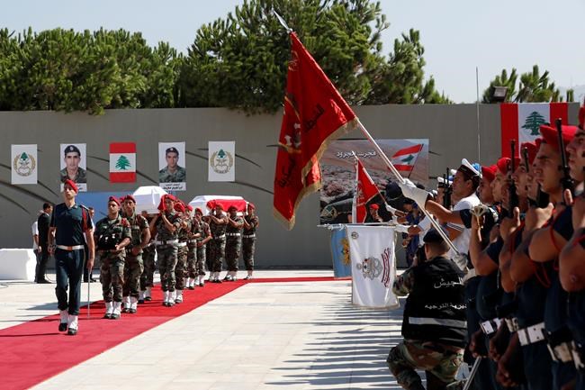 Lebanon holds state funeral for slain soldiers | iNFOnews.ca CP47256346