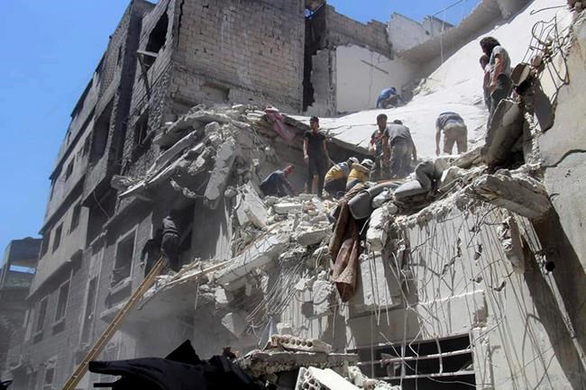 Syrian activists: At least 14 killed in rebel stronghold | iNFOnews.ca