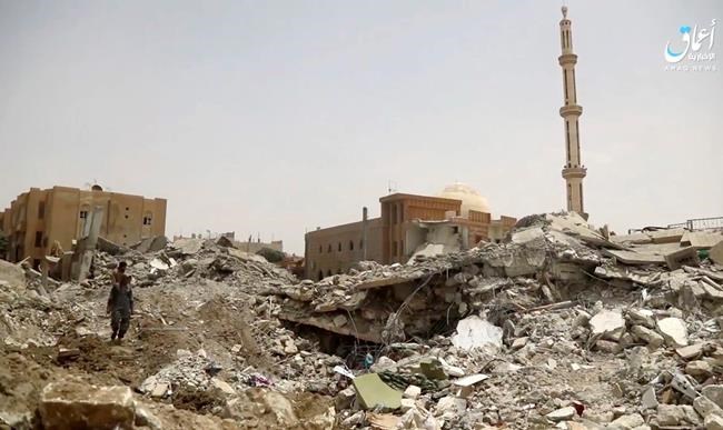 US-backed Syrian fighters reach gates of IS capital of Raqqa | iNFOnews.ca
