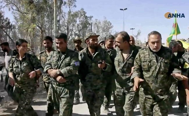 US-backed forces celebrate fall of IS 'capital,' Raqqa | iNFOnews.ca