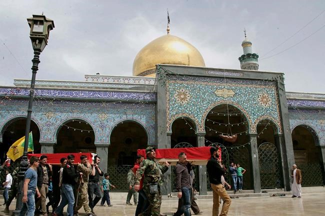 The Latest: Explosion, fire reported near Damascus airport | iNFOnews.ca CP44742057