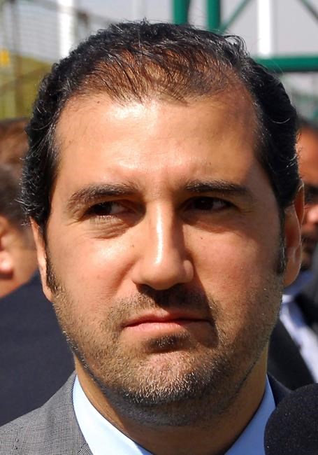 Cousin of Syria's Assad faces legal action over telecom debt | iNFOnews.ca