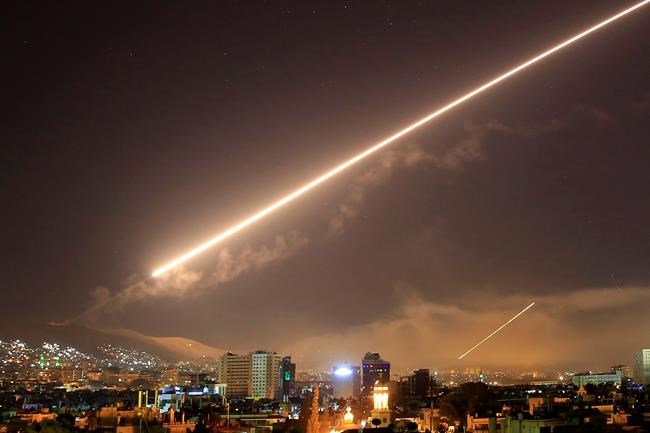 Before dawn, the streak of a missile across Damascus' sky | iNFOnews.ca Before dawn, the streak of a missile across Damascus' sky | iNFOnews.ca