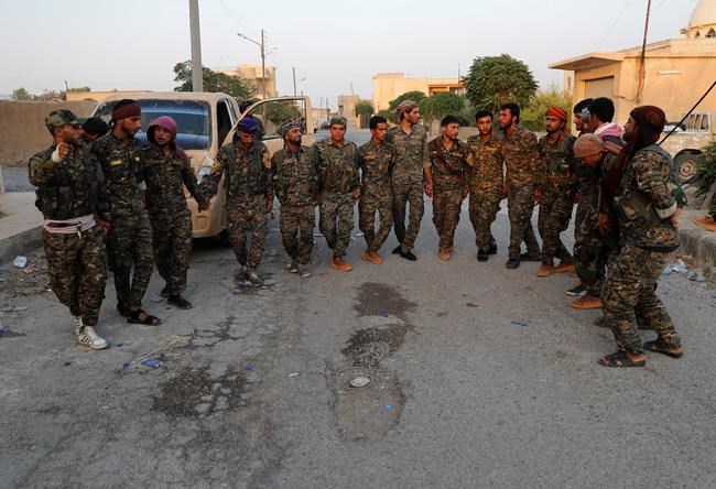 Syrian army in race with US-armed fighters for eastern Syria | iNFOnews.ca CP571422587