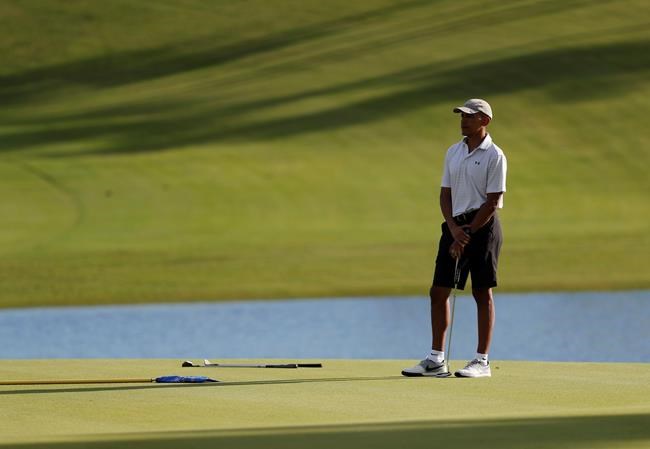 The Latest: Obamas, friends dine near Hawaii vacation home | iNFOnews.ca CP2012931691