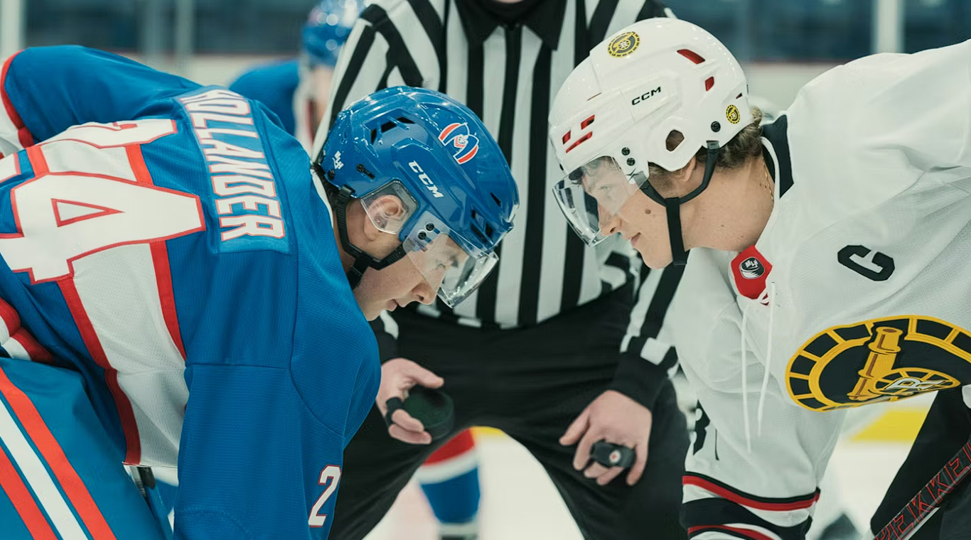 Two hockey players face-off.
