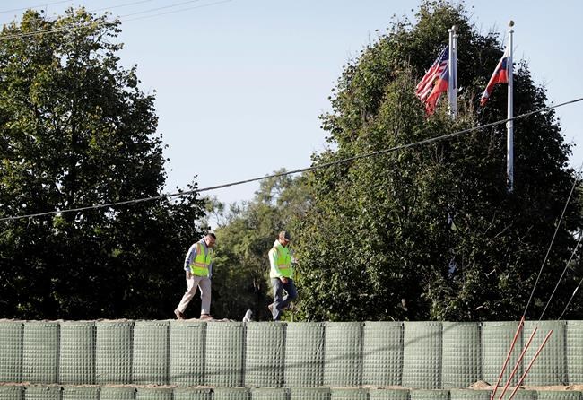 Barriers protected Cedar Rapids but not fit for all floods | iNFOnews.ca CP763631228