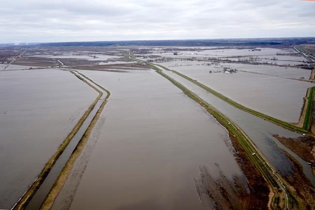 The Latest: Getting aid to flood victims is priority | iNFOnews.ca