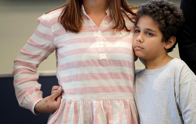 Brazilian boy, 9, released to mom after US judge's order | iNFOnews.ca CP574314662