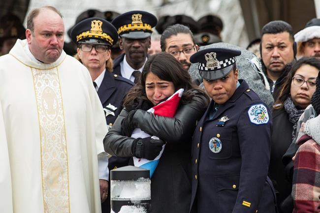 Slain Chicago officer remembered as a 'guardian' | iNFOnews.ca CP1899694556
