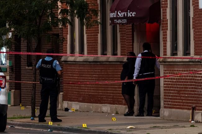 Cops: 14 injured after shooting outside Chicago funeral home | iNFOnews.ca CP322622206