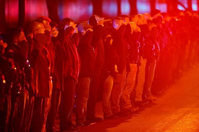 The Latest: Gunman killed himself after shot by police | iNFOnews.ca CP647923028