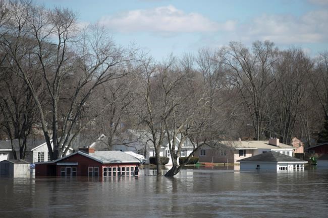 Rescues, evacuations as floodwaters breach levees in Midwest | iNFOnews.ca CP1920424837