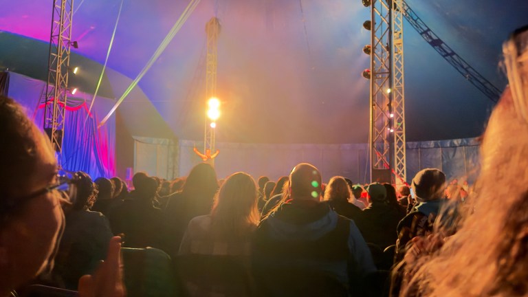 A performer on stage captivating the audience- photo credits : Tadiwanashe Machana