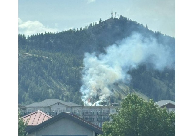 Smoke from a mountainside wildfire.