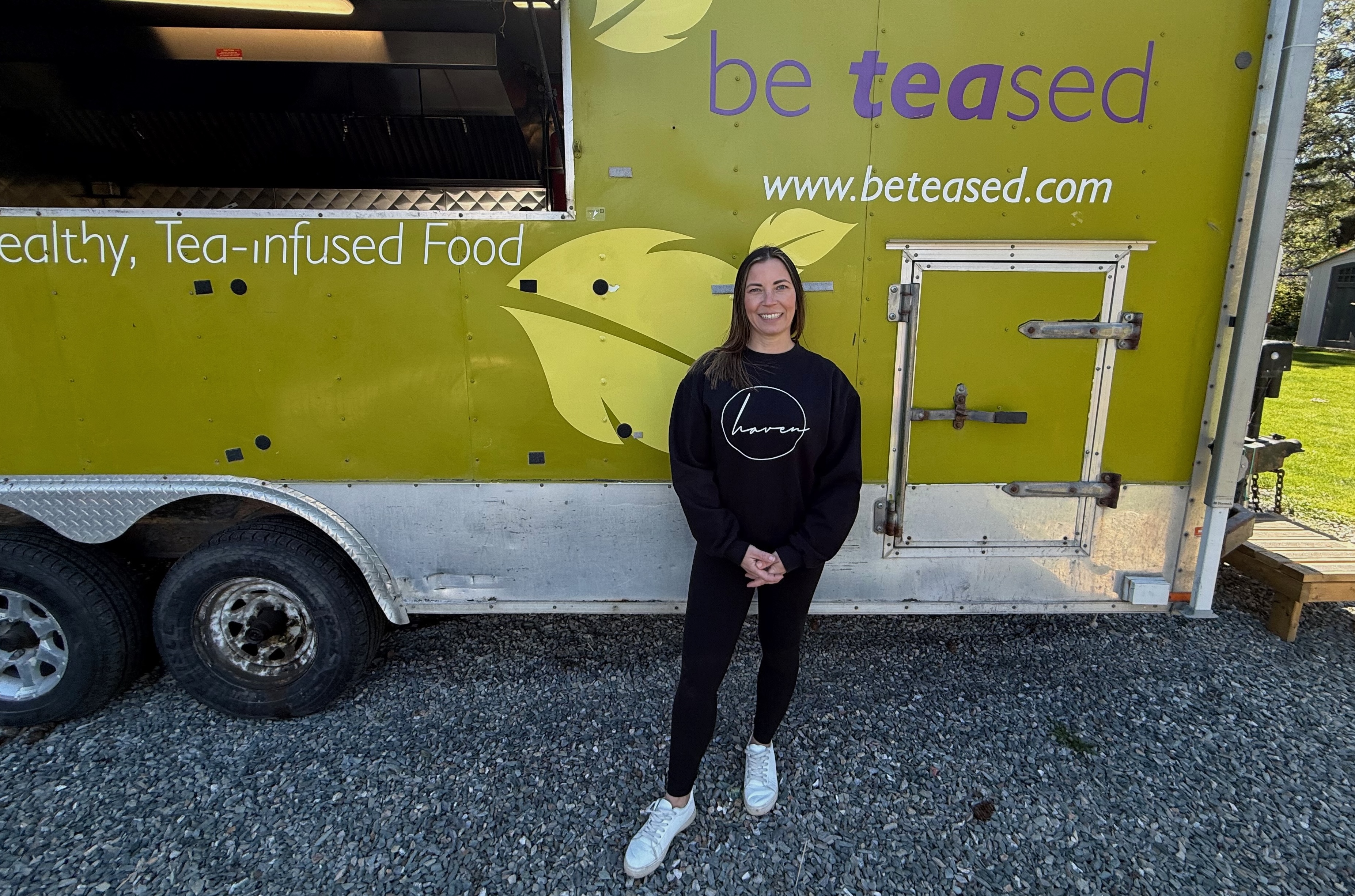 Sharon Toews stands outside her food truck.