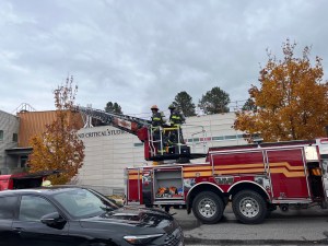 A fire truck with a ladder extended in UBCO.