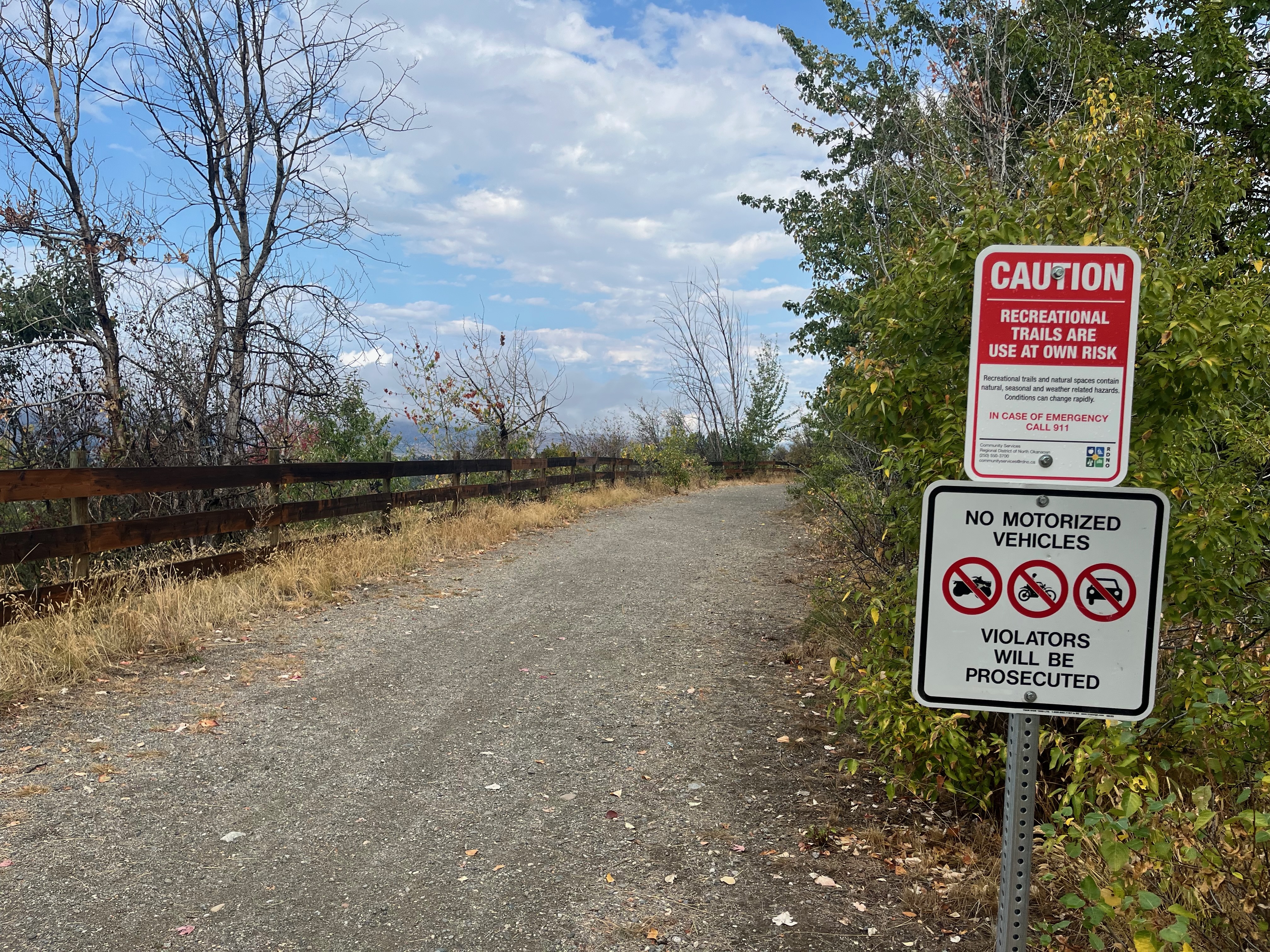 A sign at a trail head.