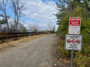 A sign at a trail head.