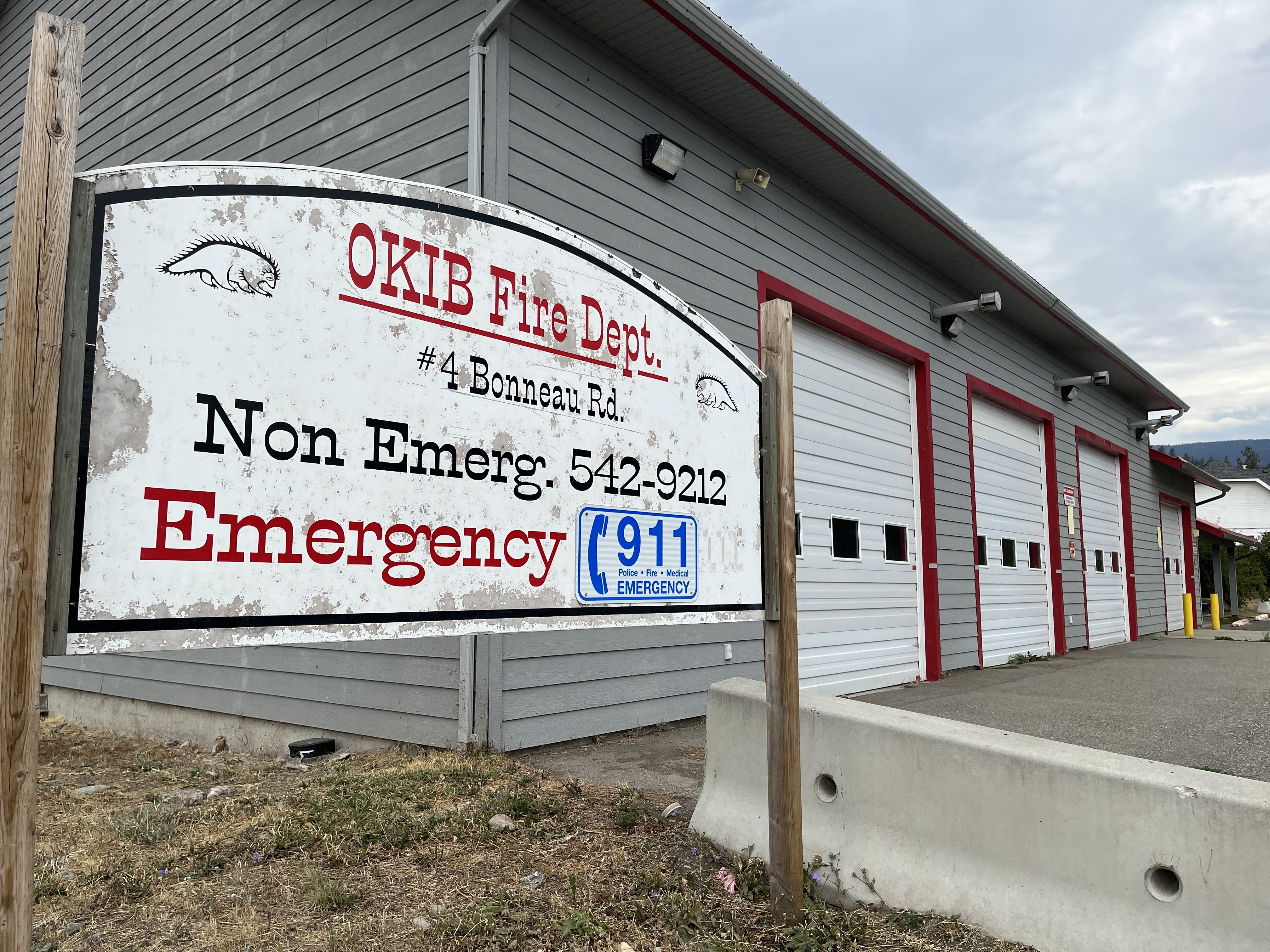 A weathered sign outside the Okanagan Indian Band fire hall.