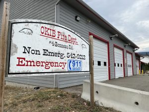 A weathered sign outside the Okanagan Indian Band fire hall.