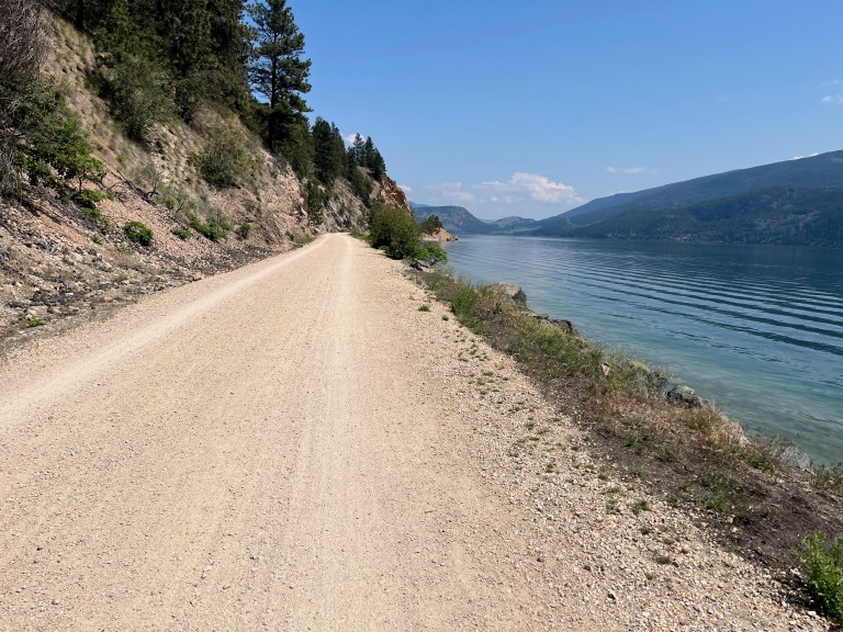 North Okanagan regional district to pay $350K to landowner over Okanagan Rail Trail expropriation | iNFOnews.ca A multi-purpose gravel path on the shore of Kalamalka Lake.