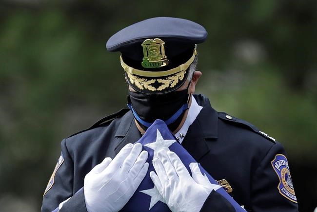 Slain Indiana officer remembered as dedicated, compassionate | iNFOnews.ca