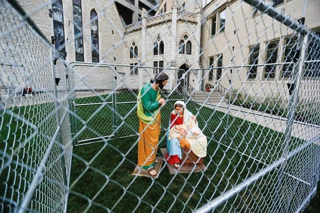 Church mirror replaces caged Holy Family immigration protest | iNFOnews.ca Church mirror replaces caged Holy Family immigration protest | iNFOnews.ca