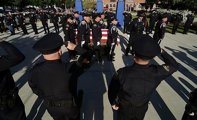 Indiana police officer killed in shootout honoured as a hero | iNFOnews.ca