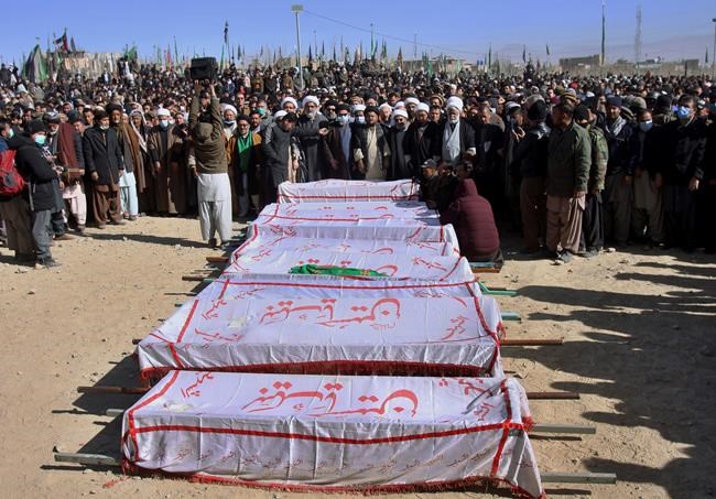 Pakistani Shiites end protests, hold funeral for 11 miners | iNFOnews.ca