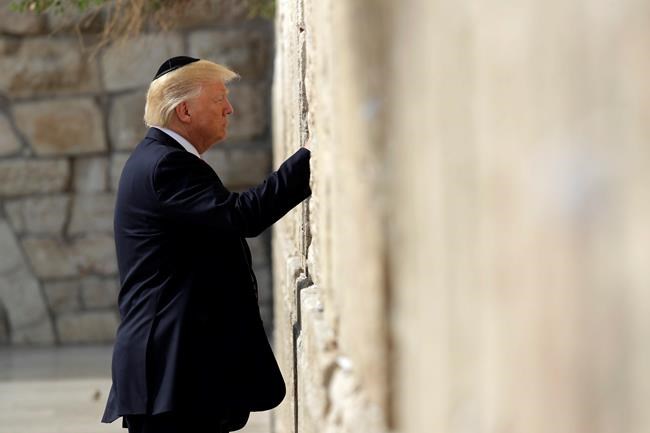The Latest: White House puts 'Jerusalem, Israel' on website | iNFOnews.ca