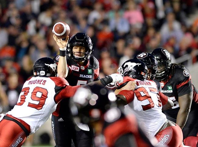 Harris passes for 396 yards as Redblacks settle for 26-26 tie against Stamps | iNFOnews.ca