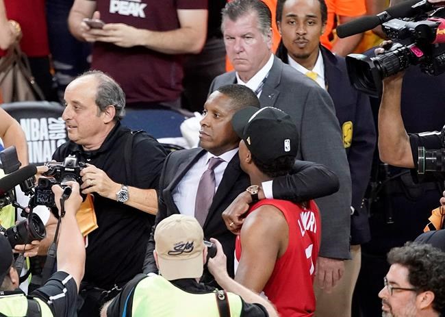 Video shows Lowry pulling Ujiri to safety following Raptors' NBA title win | iNFOnews.ca