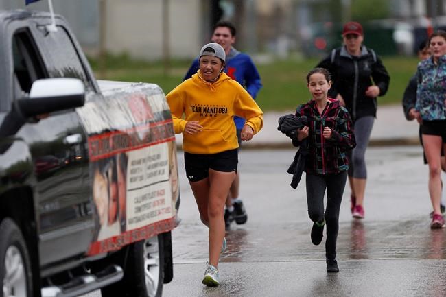 Metis teen finishes 420-km run, raises $10K for group that found cousin's body | iNFOnews.ca CP776185074