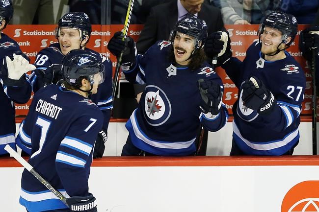 Jets beat Capitals 3-1; University of Manitoba coach serves as backup goalie | iNFOnews.ca