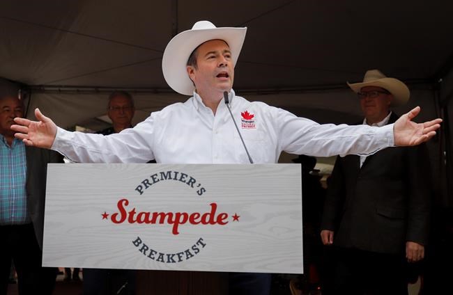 Protesters target Alberta premier at Stampede over gay-straight alliances | iNFOnews.ca