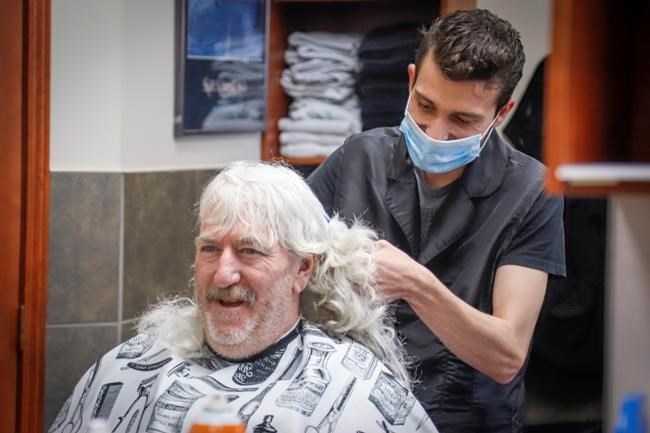 'I feel lighter:' Some Albertans thrilled with haircuts, eating in restaurants | iNFOnews.ca
