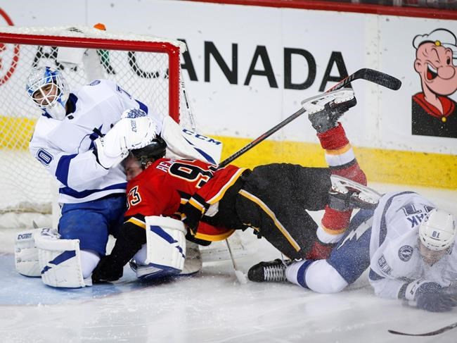 J.T. Miller stars in shootout as Tampa Bay Lightning top Calgary Flames 5-4 | iNFOnews.ca CP811602922