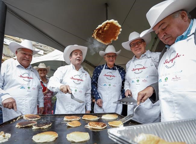 'Like-minded' premiers flip pancakes, talk politics on Calgary Stampede visit | iNFOnews.ca