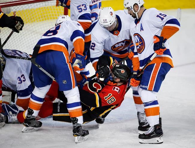 Christopher Gibson makes 50 saves, Islanders beat Flames to halt losing streak | iNFOnews.ca