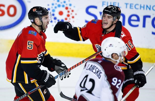 Flames score five in third period, come back to beat Avalanche 6-5 | iNFOnews.ca
