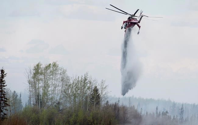 Premier Notley to survey damage to Fort McMurray on Monday, fire growth slows | iNFOnews.ca