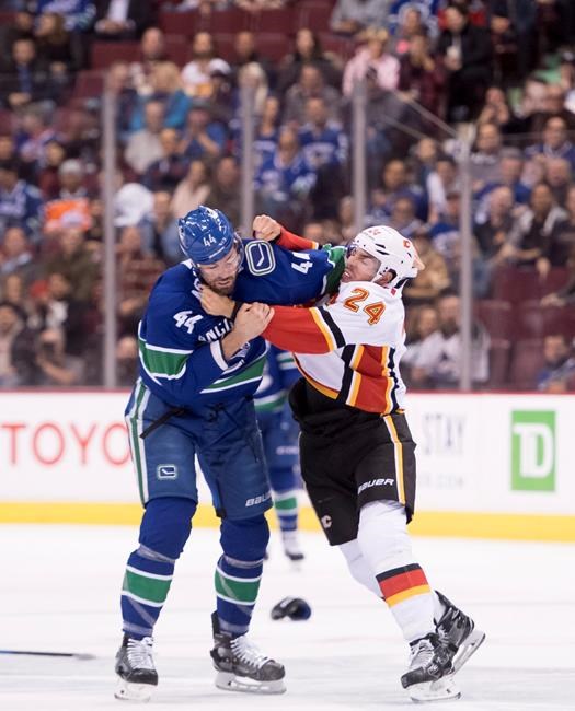 Flames defenceman Travis Hamonic out week-to-week with facial fracture | iNFOnews.ca Flames defenceman Travis Hamonic out week-to-week with facial fracture | iNFOnews.ca