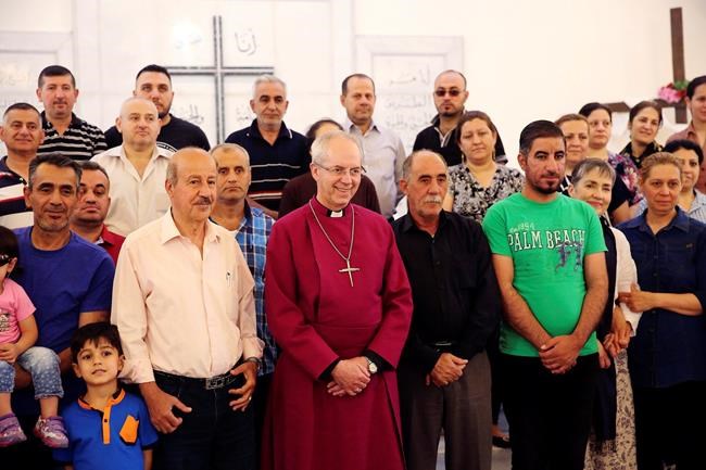 Head of Anglican church visits Christian refugees in Jordan | iNFOnews.ca CP2078789909