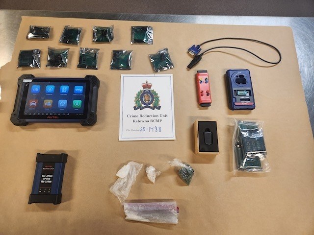 A picture of some gear used to program car key fobs displayed after being seized by police.