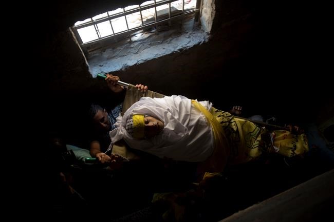 Israel warns Hamas of 'painful' strikes if protests go on | iNFOnews.ca