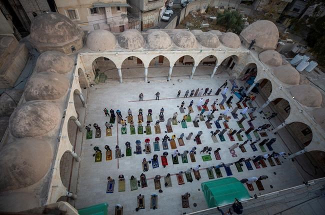 Muslims celebrate major holiday amid curfews, virus fears | iNFOnews.ca