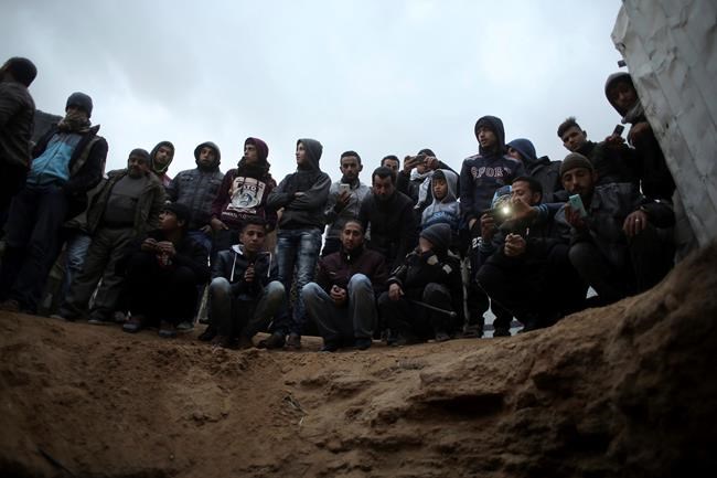 Heavy rain unearths ancient graves in backyard in Gaza | iNFOnews.ca